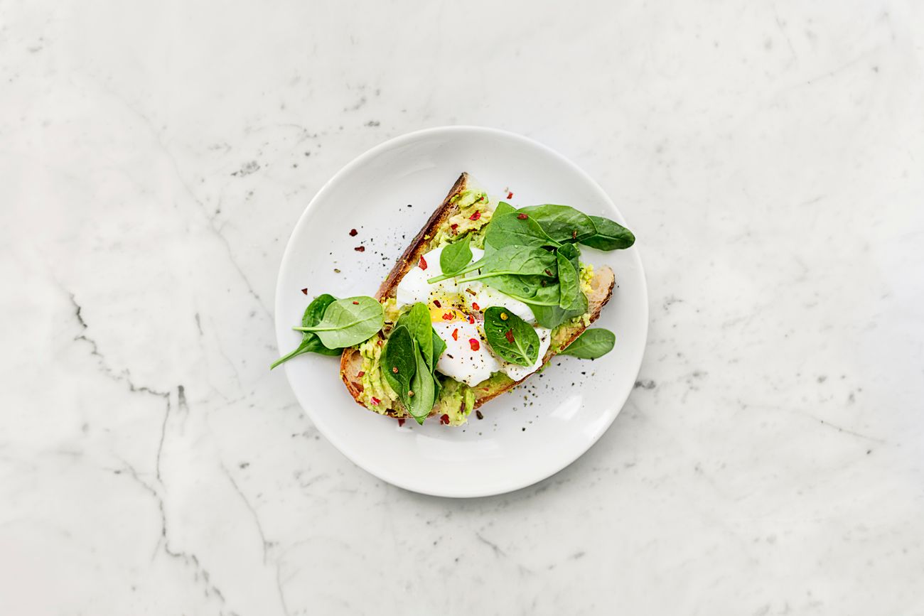 Balanced plate with protein vegetables and healthy foods