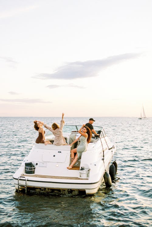 Women Partying on Boat Sailing on Sea