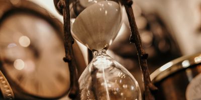 Hourglass with soft light representing the passage of time