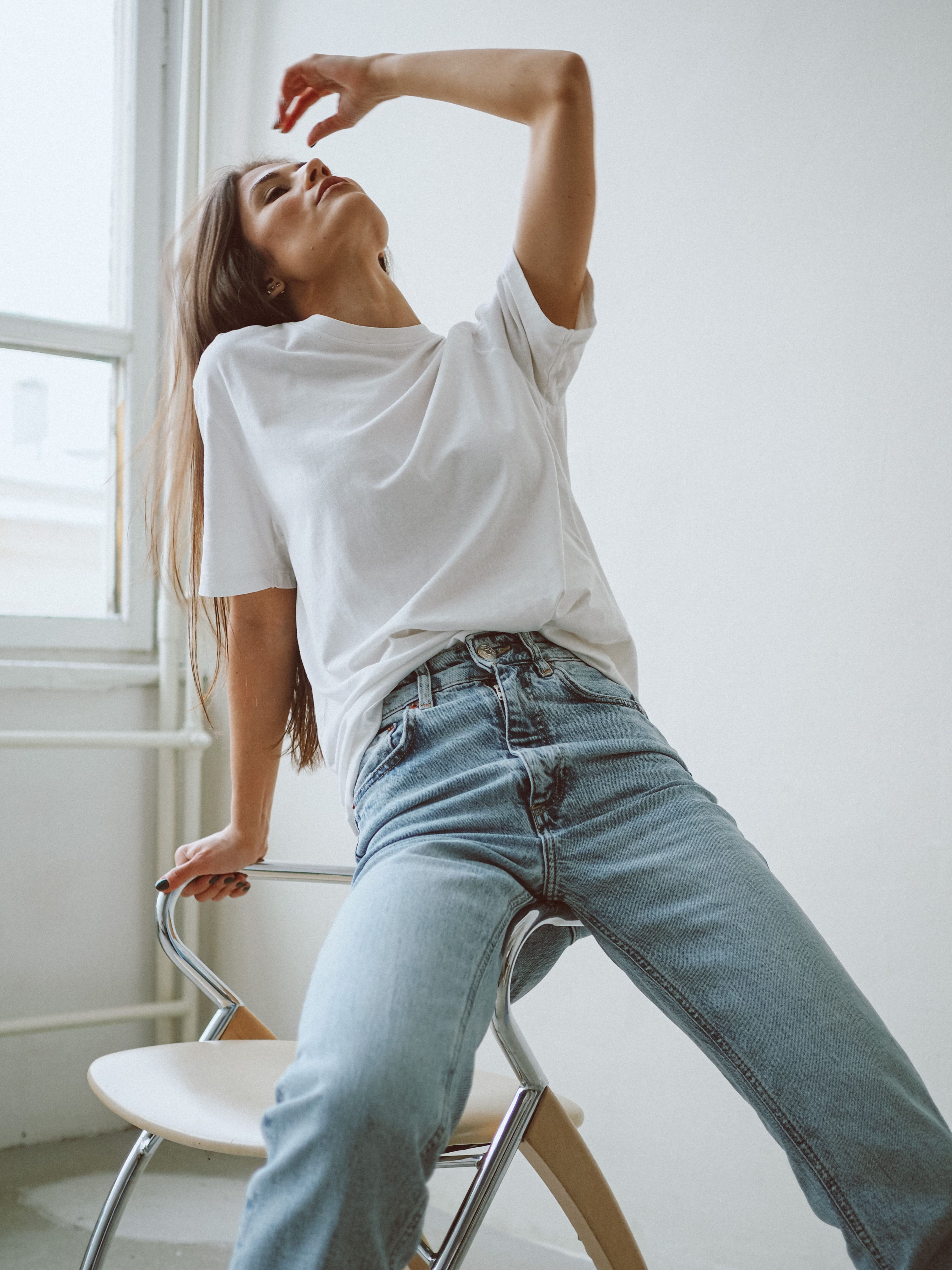 Woman in mom jeans with white t-shirt