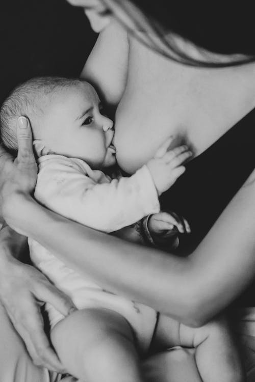 Baby being Breastfed in Black and White