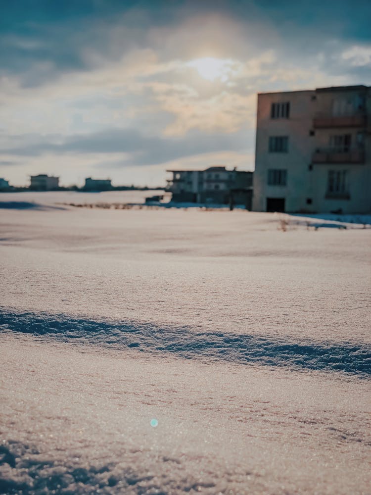 Snow On Ground On Sunny Day