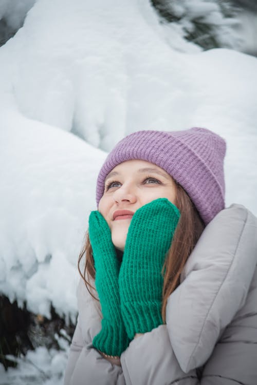 Free A Girl Wearing a Knitted Cap and a Mittens Stock Photo