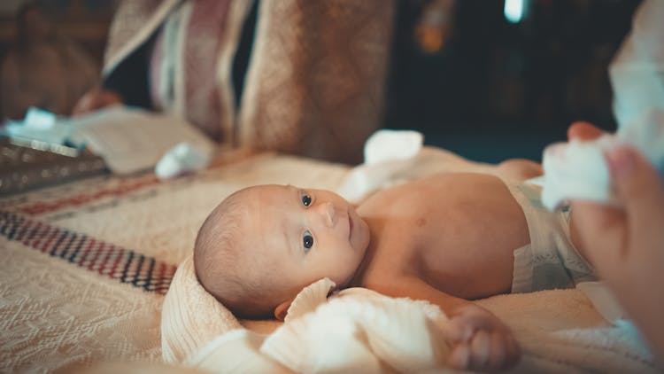 Cute Newborn Baby On Christening In Church