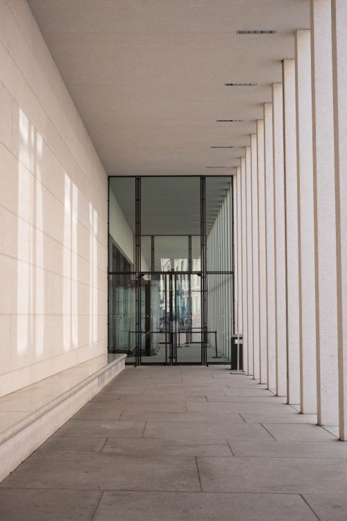 Free Explore the sleek design of the James Simon Gallery hallway in Berlin, Germany, showcasing modern glass architecture. Stock Photo