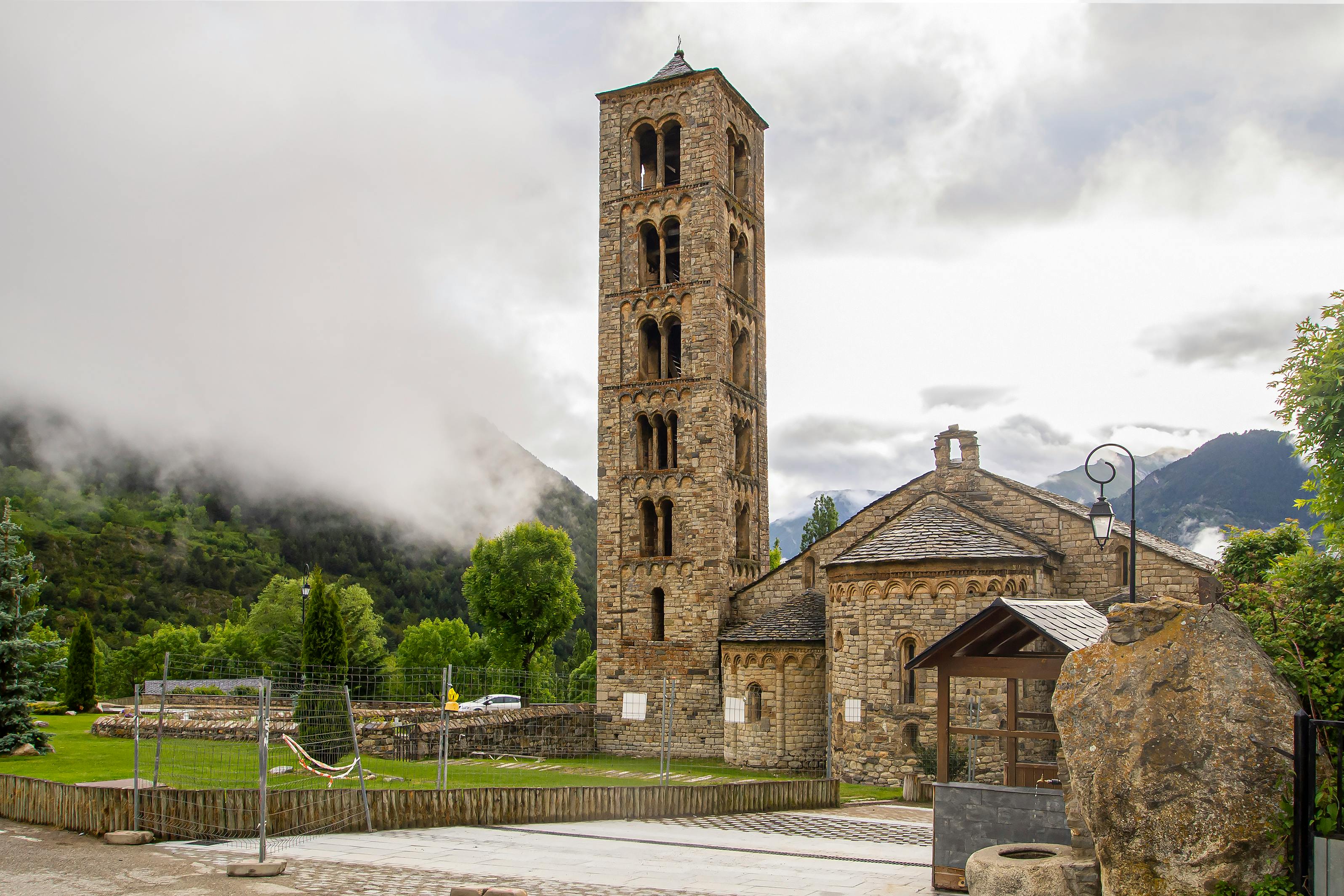 exterior of a beautiful church in Ho with mountains in background
