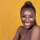 Smiling Topless Woman Wearing Gold Necklace