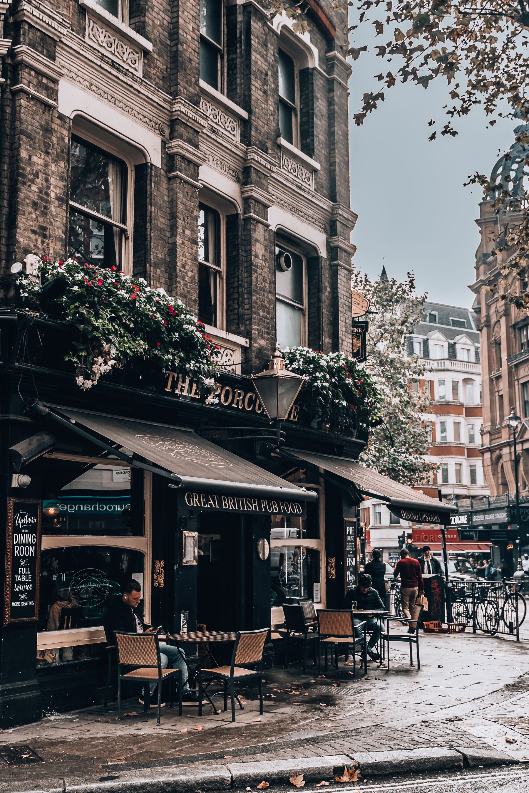 A traditional pub standing on a street corner
