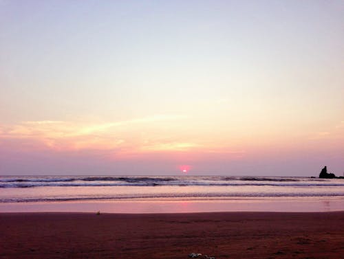 日出, 日落, 波浪撞擊 的 免费素材图片