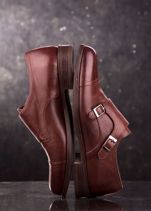 Free Close-up of elegant brown leather monk strap shoes in studio lighting. Stock Photo