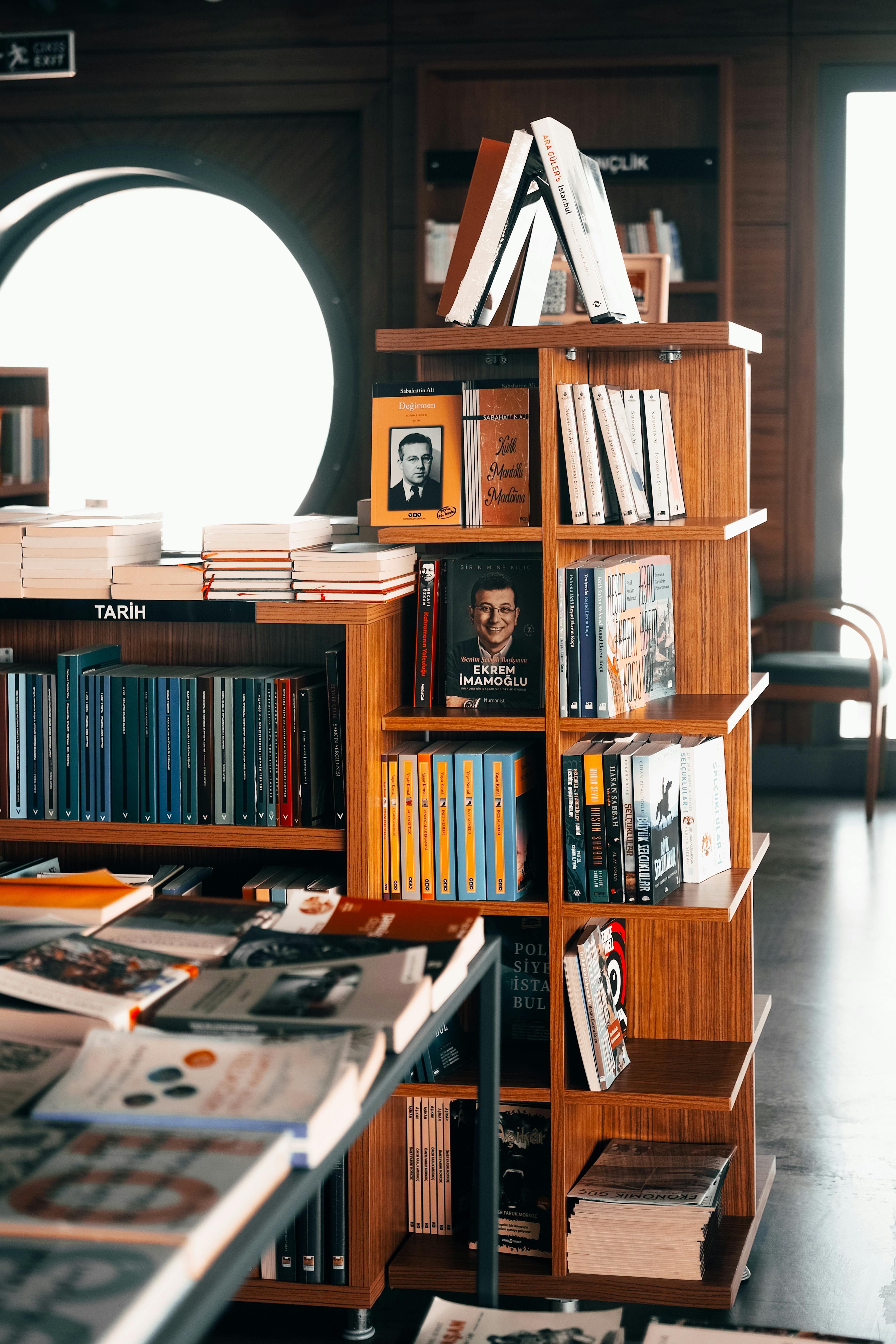Cozy bookstore interior with wooden shelves and reading nook