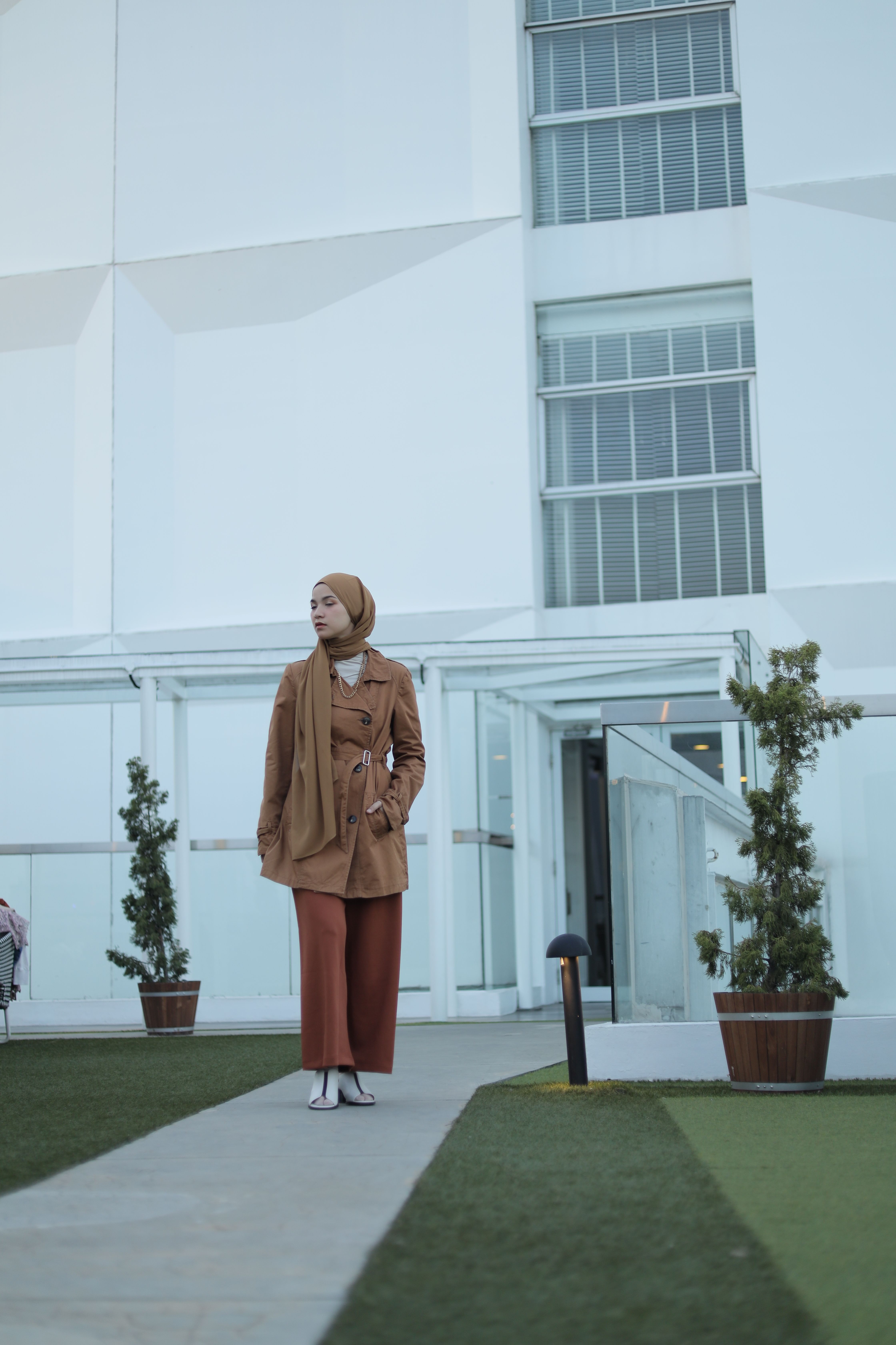 Woman in Brown Coat Wearing Brown Hijab · Free Stock Photo