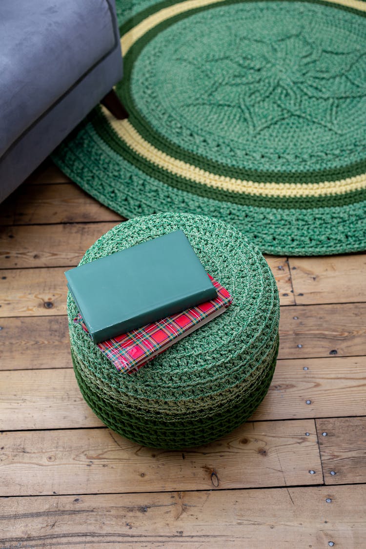 Round Carpet On Wooden Floor