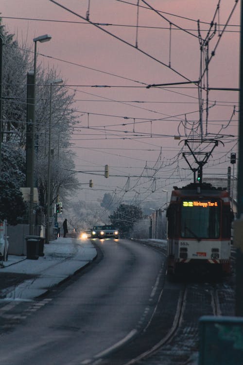 Photos gratuites de coucher de soleil, couvert de neige, entraîner