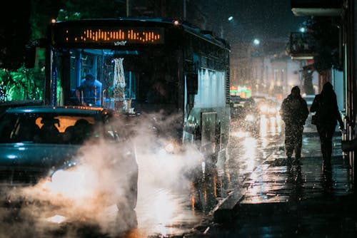 People Walking on the Street at Night