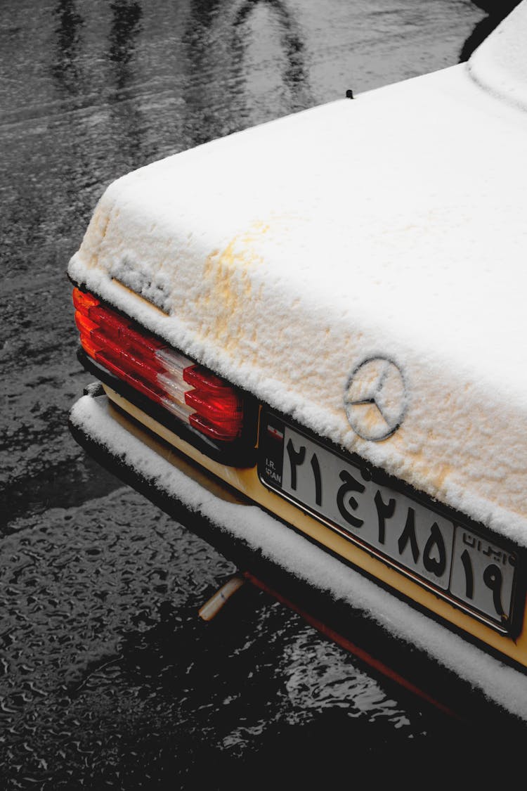 Car Covered In Snow