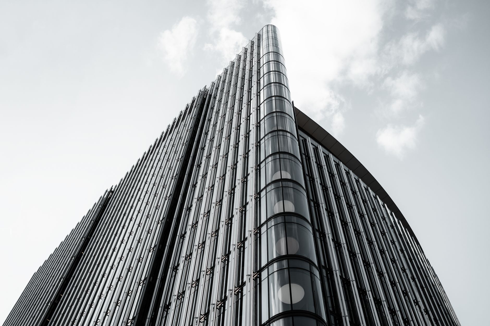 A sleek and modern high-rise building exterior photographed in London, England.