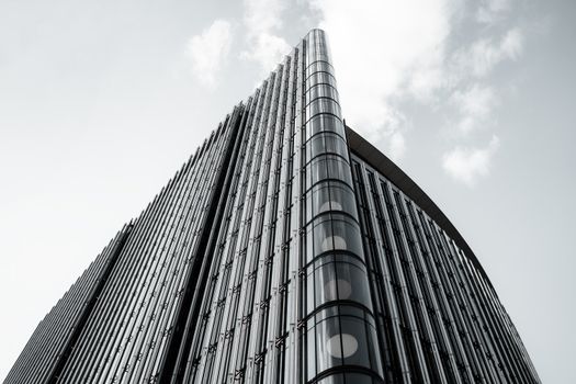 A sleek and modern high-rise building exterior photographed in London, England.