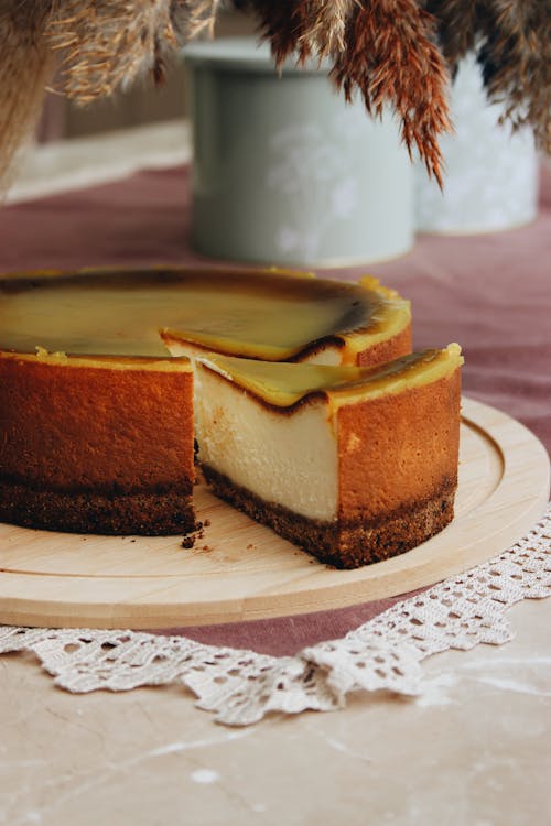 Free Cheesecake on a Wooden Plate  Stock Photo