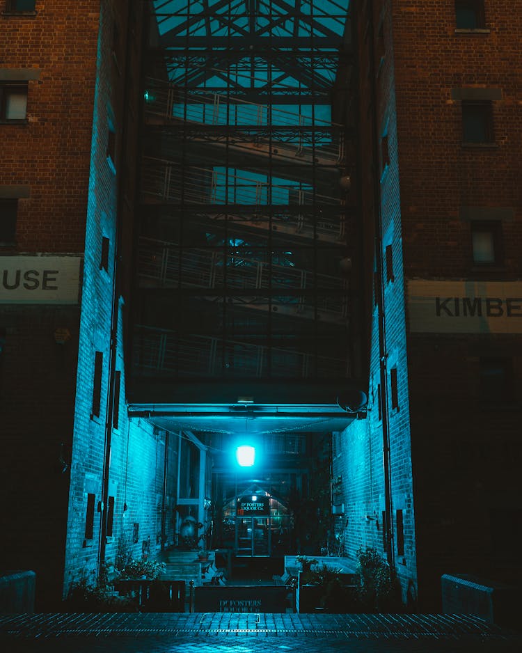 Photo Of A Brick Building At Night