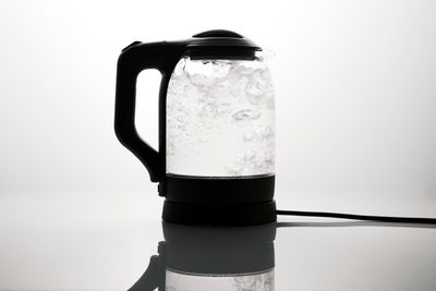 Glass-body electric kettle at a rolling boil, photo by Engin Akyurt on Pexels