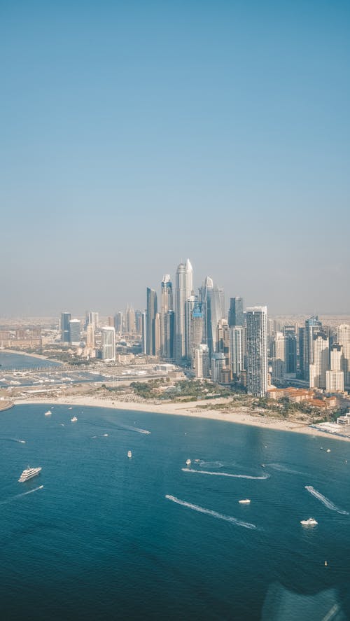 Free Aerial View of City Buildings near the Sea Stock Photo