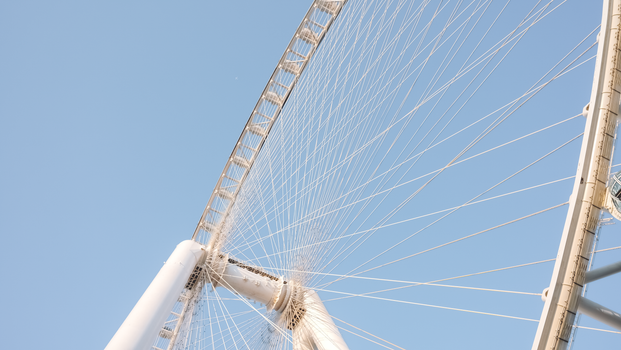 Low-Angle Shot of a White Ferris Wheel