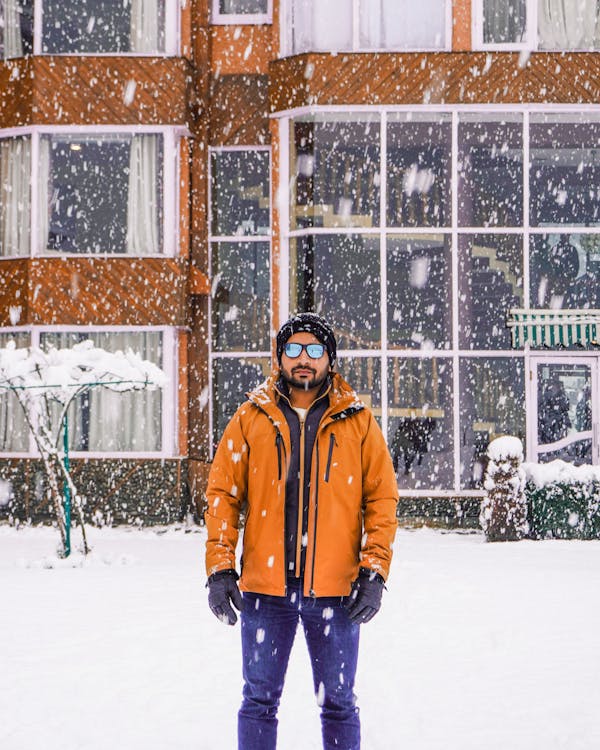 Man in Winter Clothes During Snow Fall · Free Stock Photo