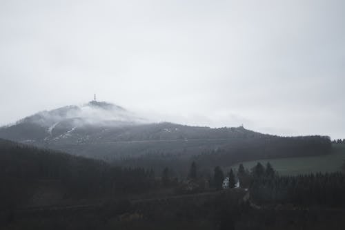 Free Thick Fog Covering the Mountain Peak Stock Photo