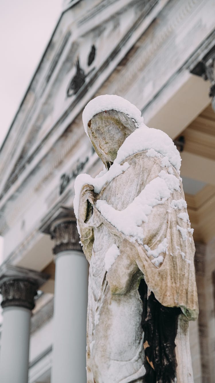 A Snow Covered Statue