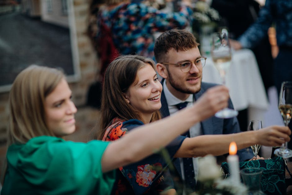 Group toast at a Chinese banquet with baijiu glasses