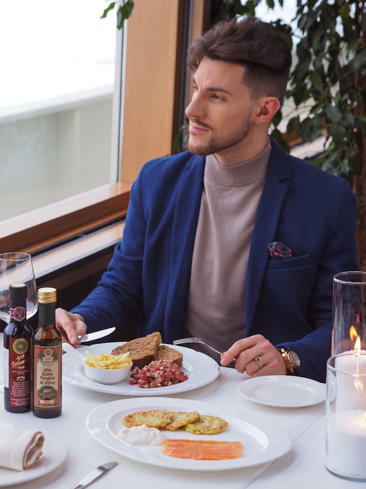 Man Eating In A Restaurant 