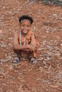 A Kid Flashing a Toothy Smile