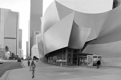 Free Black and white image of Walt Disney Concert Hall with urban backdrop in Los Angeles. Stock Photo