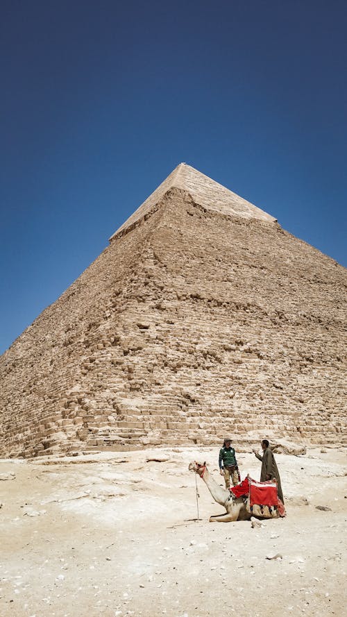 Free Tourists Visiting a Pyramid Site Stock Photo