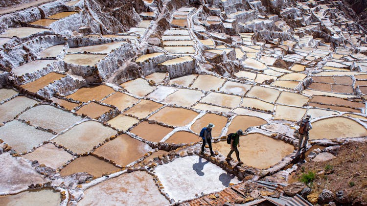 People In The Salt Mines In Cusco Peru