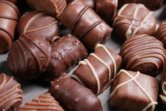 Assorted chocolates on a tray, photo by Towfiqu barbhuiya on Pexels