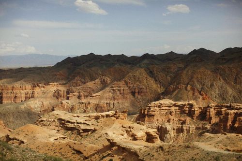 Free Explore the breathtaking rock formations of Charyn Canyon under a clear daylight sky. Stock Photo