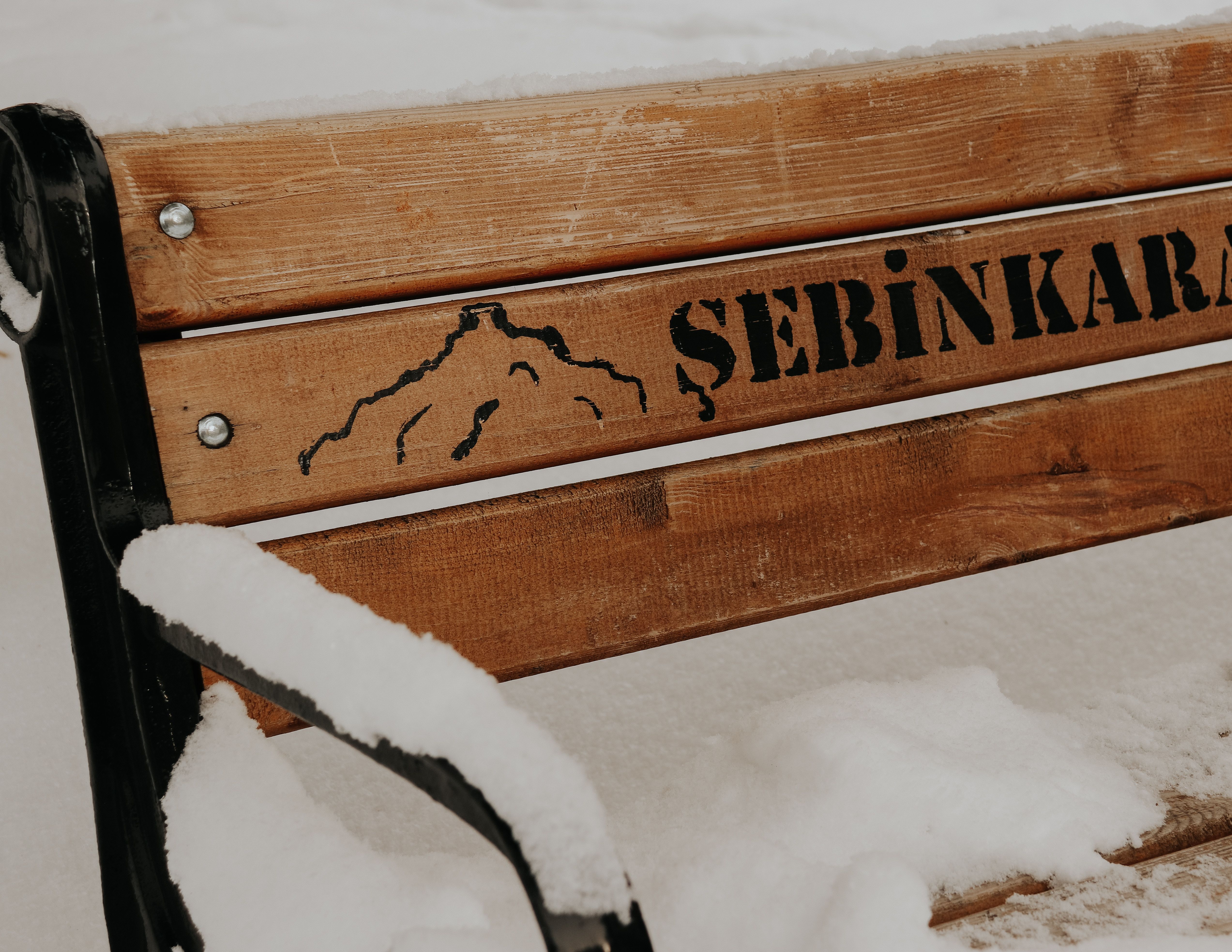 A Brown Wooden Bench Covered With Snow · Free Stock Photo
