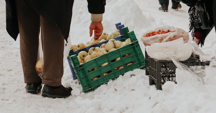 Customer Buying From Outdoor Vendor