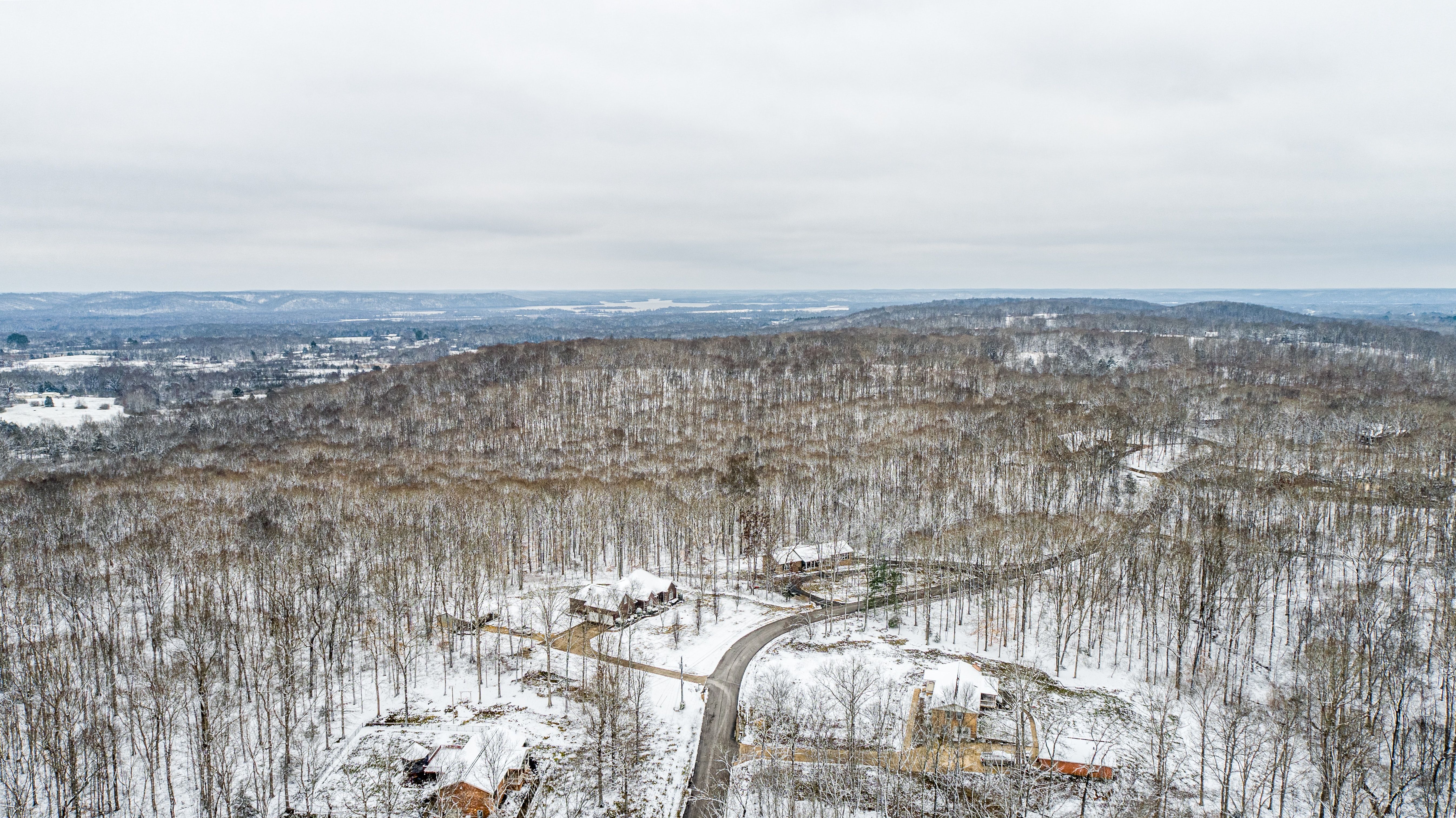 Aerial View of Trees and Snow Covered Field · Free Stock Photo