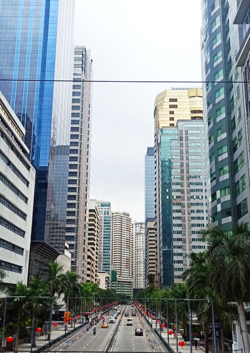 Free Vibrant cityscape of Pasig City with towering skyscrapers and busy streets. Stock Photo