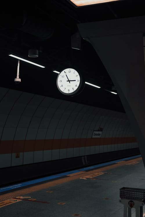 Free Black and White Hanging Analog Clock at the Train Station  Stock Photo