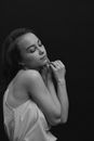 Black and White Portrait of Woman with her Arms Entwined