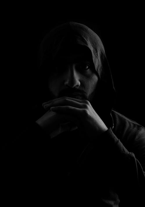 Free Grayscale Photo of Man in Hoodie Stock Photo