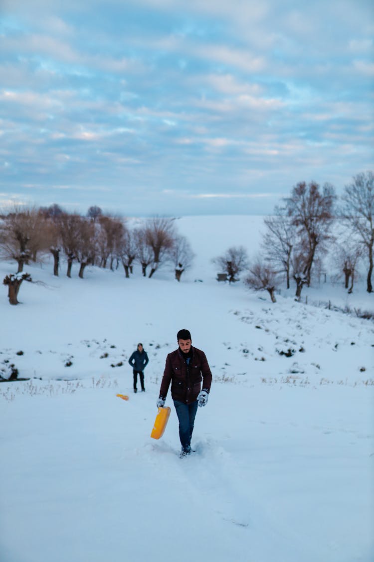 Man Walking On Snow