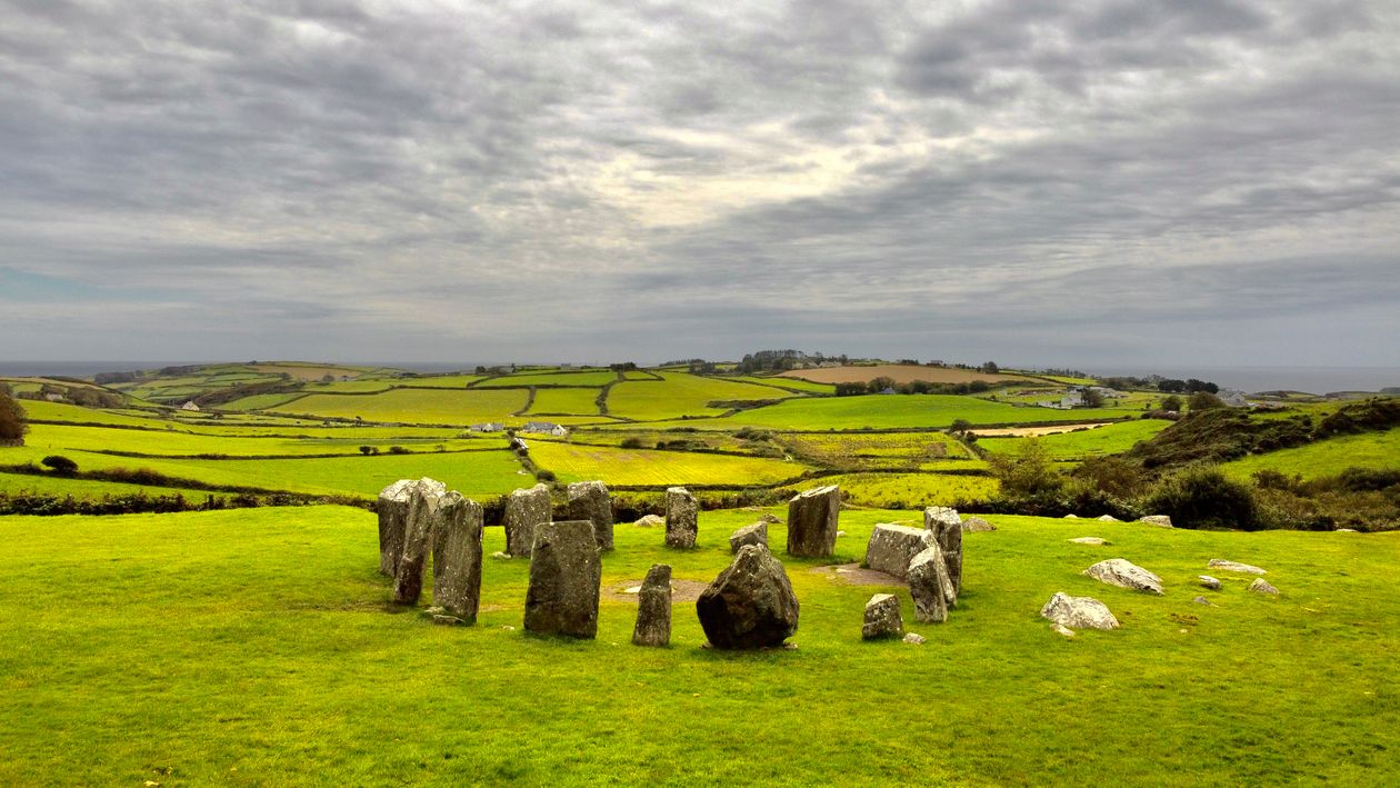Gray Rock Formation on Green Grass Field · Free Stock Photo