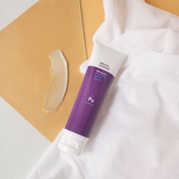 Studio shot of Juliette Armand cleansing cream with minimalistic setup.