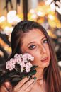Woman With Pink Lipstick Holding White Flowers