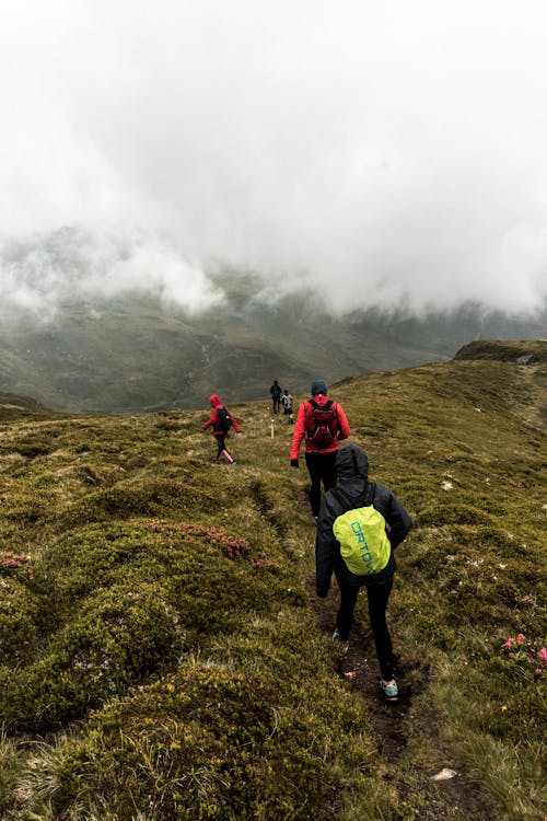 People Hiking a Mountain